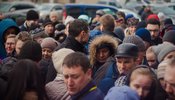 a busy crowd in a street