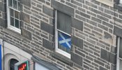 Scottish flag in window