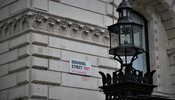 the street sign for downing street