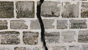 Brick wall with a crack.