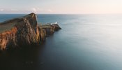 a coastal cliff in the sunset